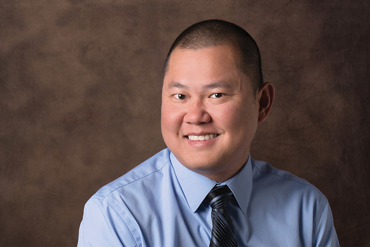 Headshot of Minh Dang, PharmD, landscape orientation